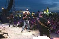 At the front of the stage