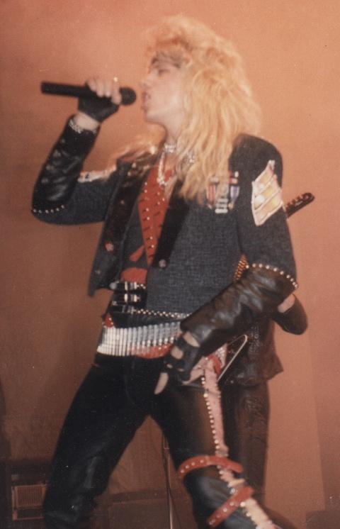 At the microphone