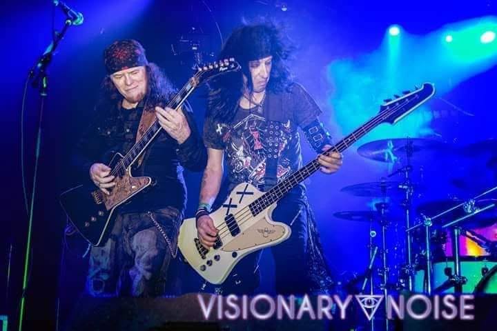 Guitar and bass in blue light