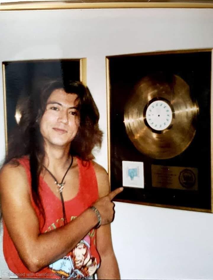 Beside the gold record